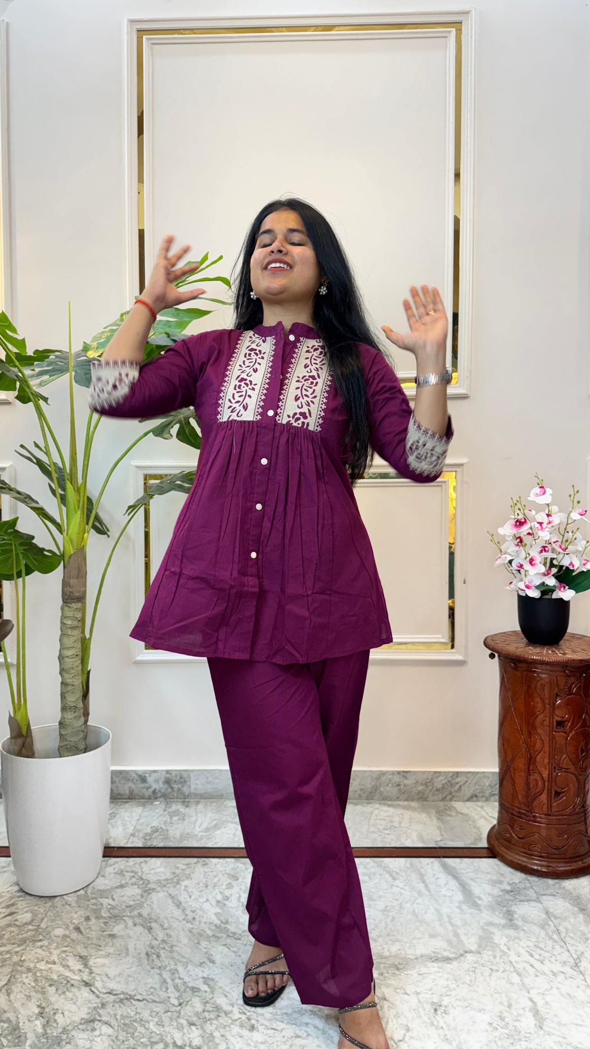 Wine purple kurti palazzo co-ord set shown in movement